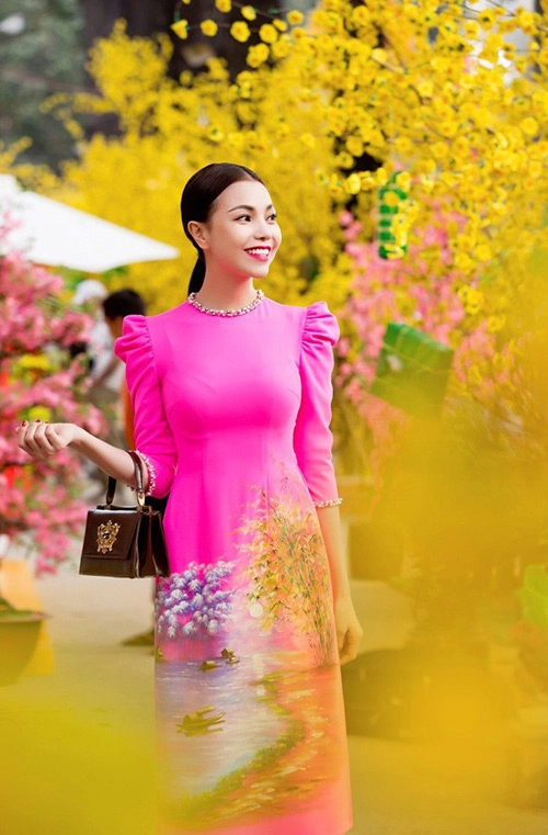 Trang điểm làm tóc diện áo dài đẹp tựa trà ngọc hằng - 11