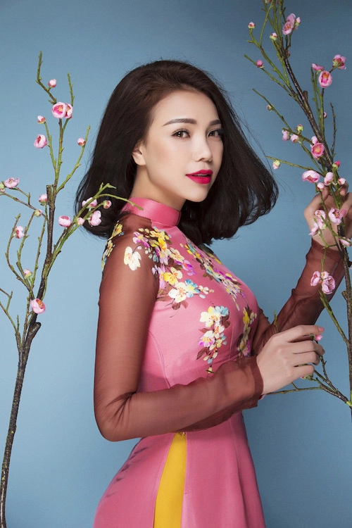 Trang điểm làm tóc diện áo dài đẹp tựa trà ngọc hằng - 13