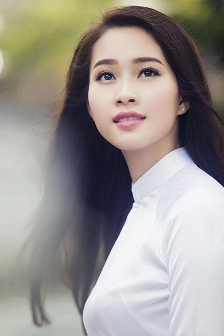 Hoa hậu thu thảo đẹp mê mẩn với áo dài nữ sinh - 12