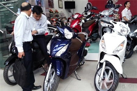 Honda mỉm cười trên thị trường xe máy năm 2014 - 1