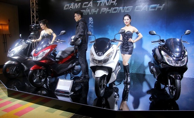 Thị trường xe máy 2014 trở nên sôi động với một loạt xe mới vừa được ra mắt - 7