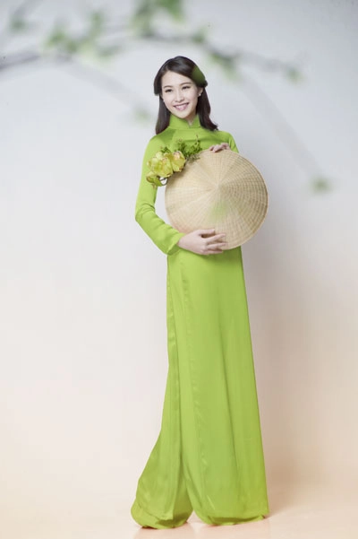Hoa hậu thu thảo dịu dàng cùng áo dài và hoa - 10