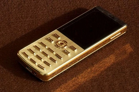 Điện thoại dát vàng mặc áo da cao cấp - 1