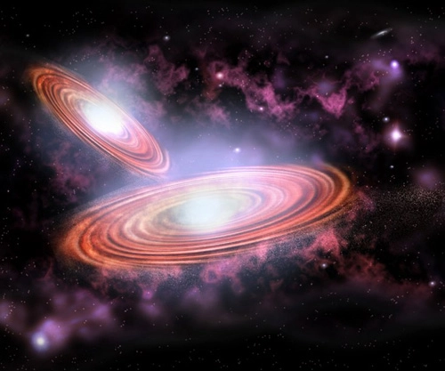 Phát hiện hai siêu hố đen có nguy cơ lao vào nhau - 1
