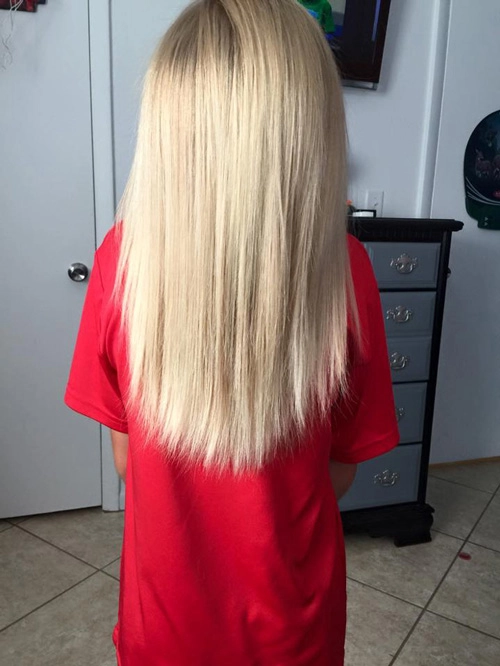 Bé trai 8 tuổi chịu bị bắt nạt hơn 2 năm để nuôi tóc dài - 1