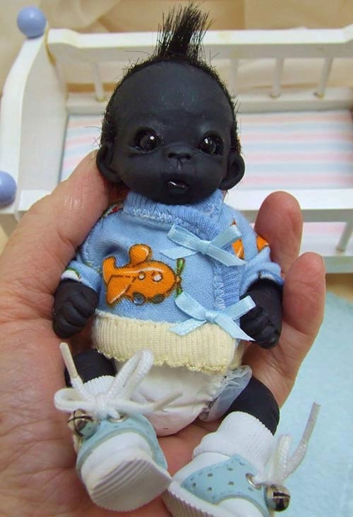 Sự thật gây sốc về em bé nam phi đen nhất thế giới - 13