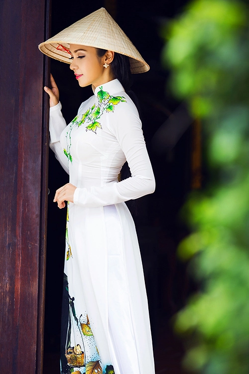 Việt trinh khoe nhan sắc vượt thời gian với áo dài - 12