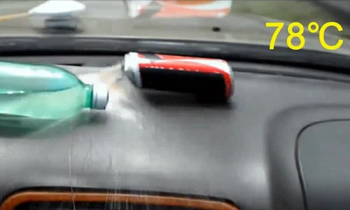  nắng nóng có thể làm nổ lon nước trong cabin ôtô - 1