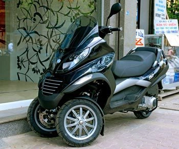  piaggio đưa động cơ hybrid lên xe tay ga - 1