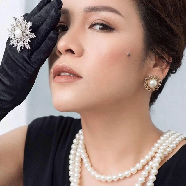 Diva mỹ linh có em gái giống hệt chị đằm thắm bao nhiêu em sắc sảo bấy nhiêu - 7