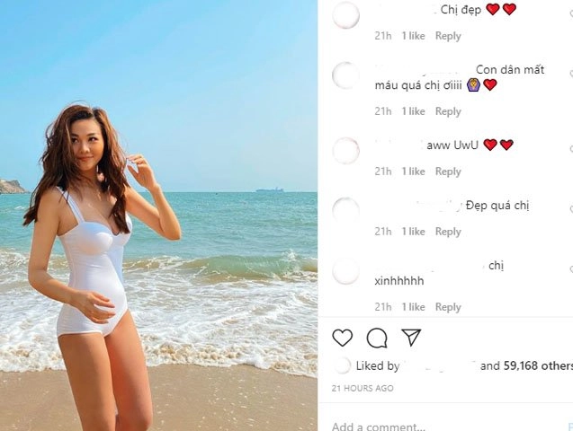 Đứng ngoài xu hướng không bikini màu sắc nổi bật thanh hằng đẹp tinh khôi với áo tắm trắng - 4