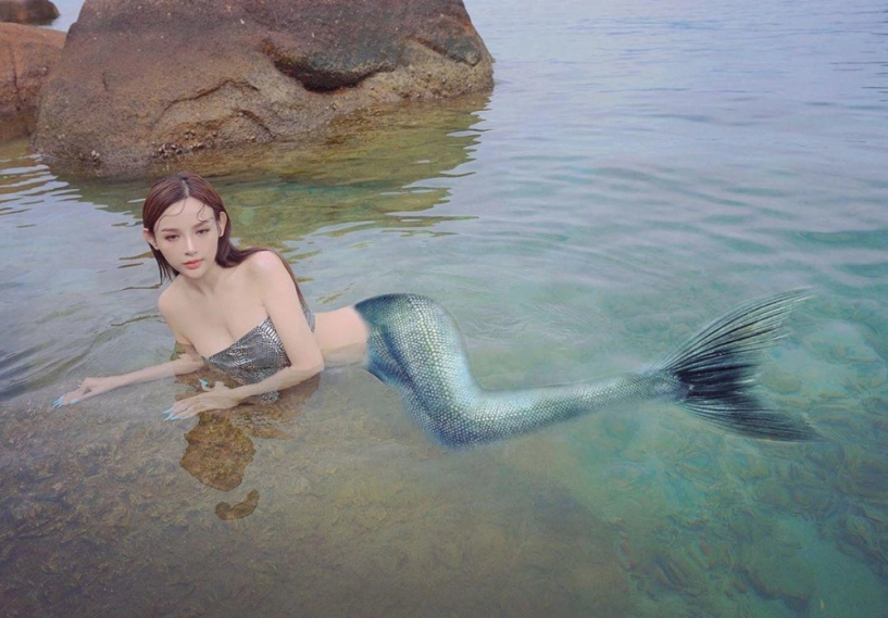 Chớp mắt tưởng huyền baby mọc đuôi cá hóa ra là do cách tạo dáng và photoshop - 1