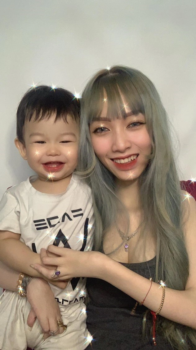 Chia tay mới biết trong bụng có đứa trẻ 9x dùng chân chăm con giờ 35000 người hâm mộ - 5