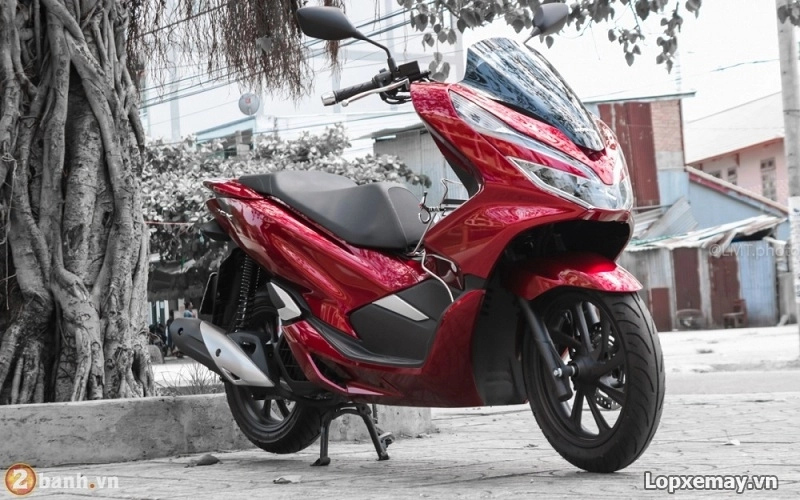 Vỏ xe pcx 2018 chọn vỏ xe máy michelin hay vỏ xe máy dunlop - 1