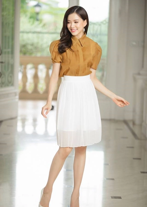 Chỉ mất hơn trăm nghìn mua một chiếc chân váy trắng nàng tha hồ phối nhiều set đồ sang xịn - 1