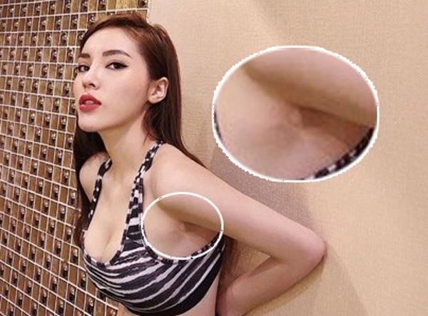 Á hậu bạo nhất việt nam từng kêu fans sờ thử xem ngực là thật hay giả - 16