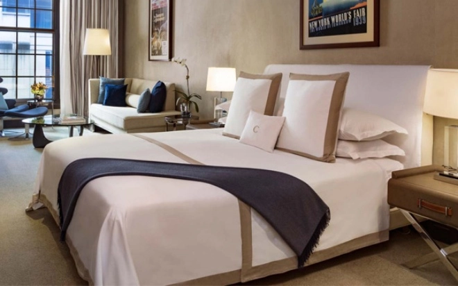 Tại sao các khách sạn sử dụng khăn trải giường màu trắng biết lý do bạn sẽ muốn học theo - 1