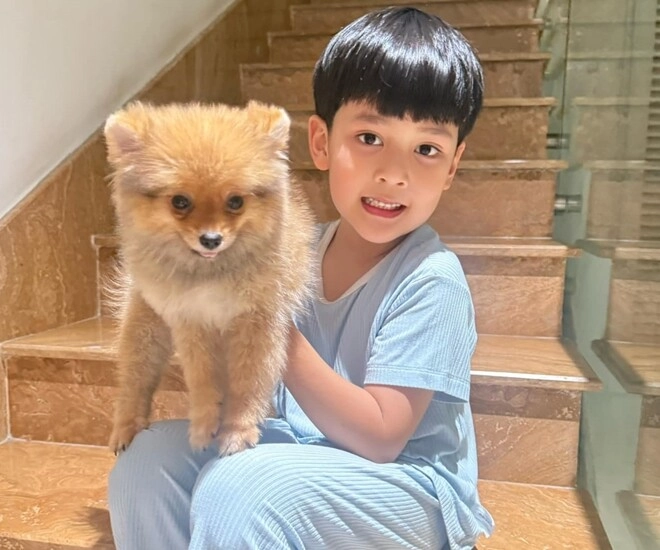 Gia đình đàm vĩnh hưngđón thêm thành viên mới bé polo6 tuổi đã lên chức anh - 1