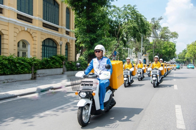 Honda việt nam và bưu điện việt nam đẩy mạnh hợp tác mở rộng dự án sử dụng xe điện giao hàng - 1