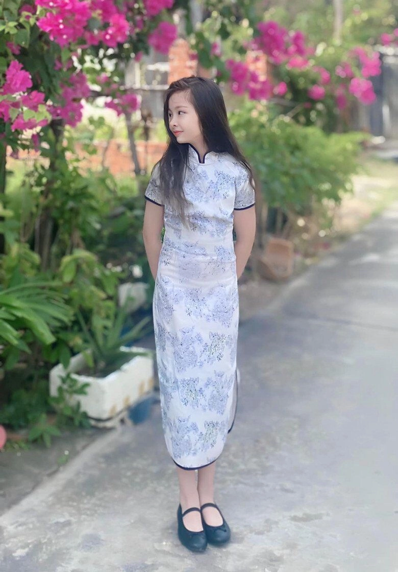 Bé gái việt giành giải nhất trên báo anh vì xinh như thiên thần giờ 11 tuổi gương mặt thay đổi nhiều - 13