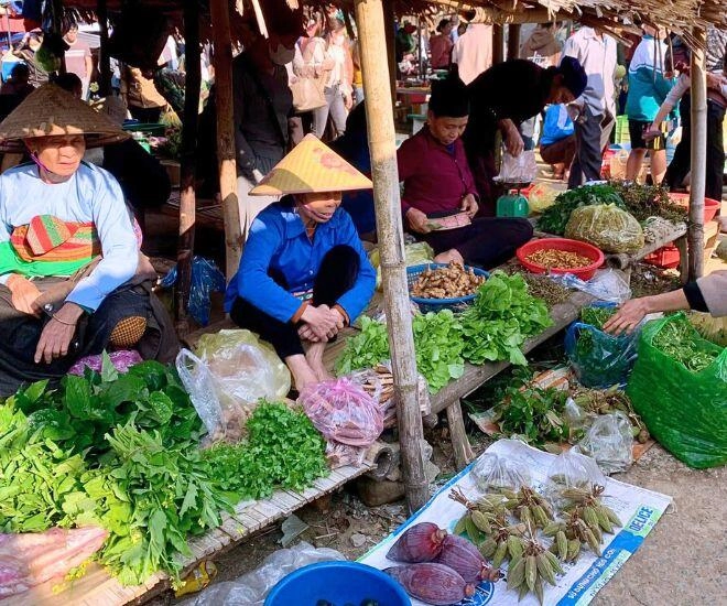 Phiên chợ tồn tại từ gần trăm năm đến nay là địa điểm độc lạ và niềm tự hào của người xứ thanh - 1