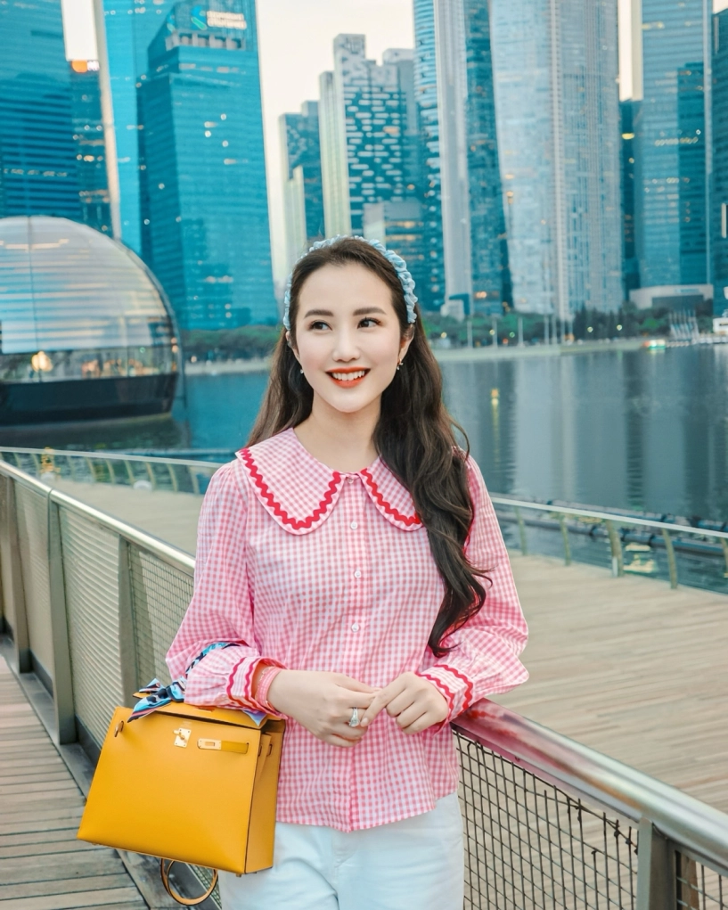 Vợ phan thành xách túi 600 triệu đồng đi du lịch - 2