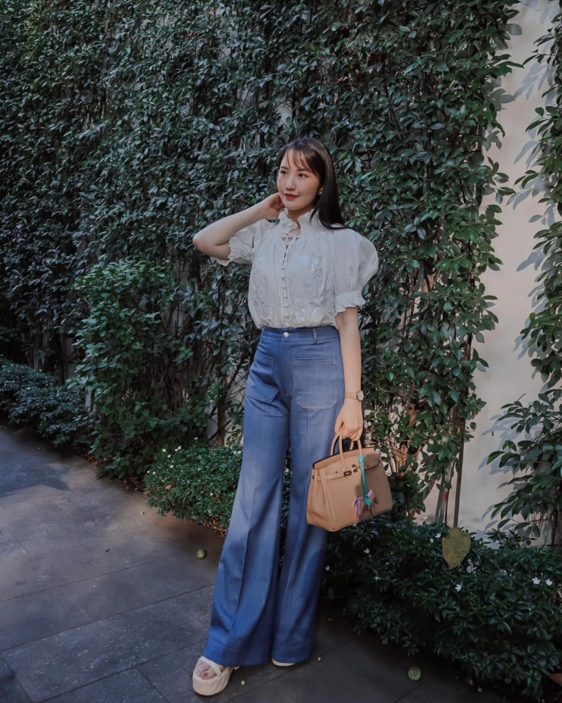 Vợ phan thành xách túi 600 triệu đồng đi du lịch - 7