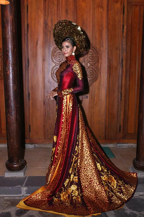 Á hậu trương thị may mặc lại áo dài từng thi miss universe 2013 - 2